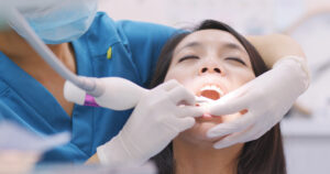dental patient undergoing scaling and root planing